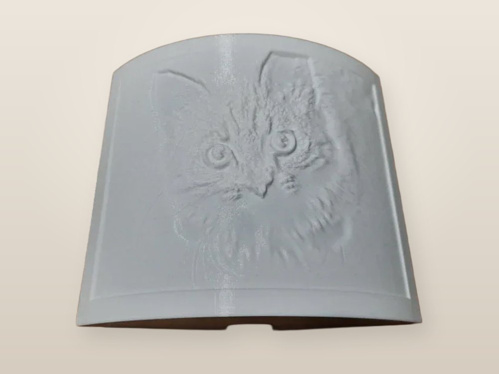 The lithophane panel unlit, showing the 3D relief