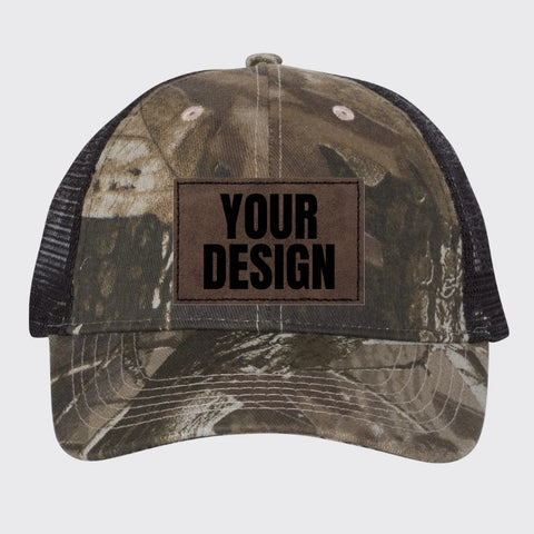 Custom Realtree camo leather patch hat, Kati LC5M mesh back cap with a brown leatherette patch reading Your Design