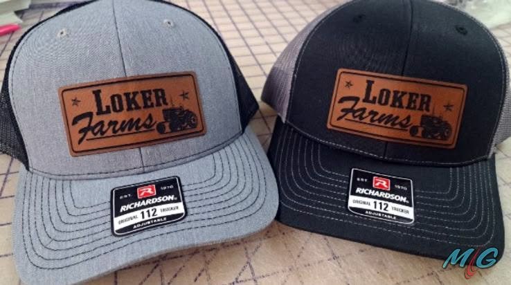 Loker Farms laser-etched leatherette patch hats on Richardson 112 truckers