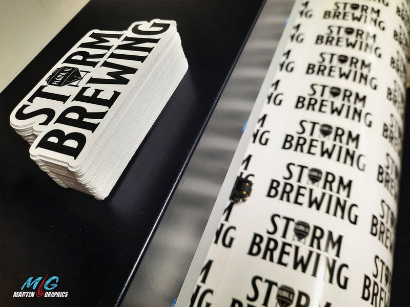 Storm Brewing die-cut stickers coming off the press