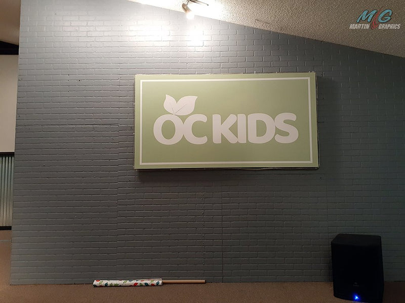 Oc kids — custom signage