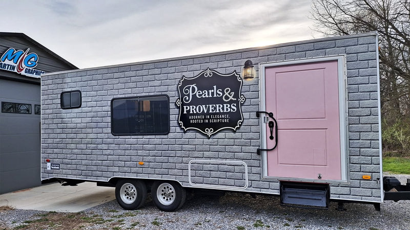 Pearls & Proverbs brick-look camper trailer wrap